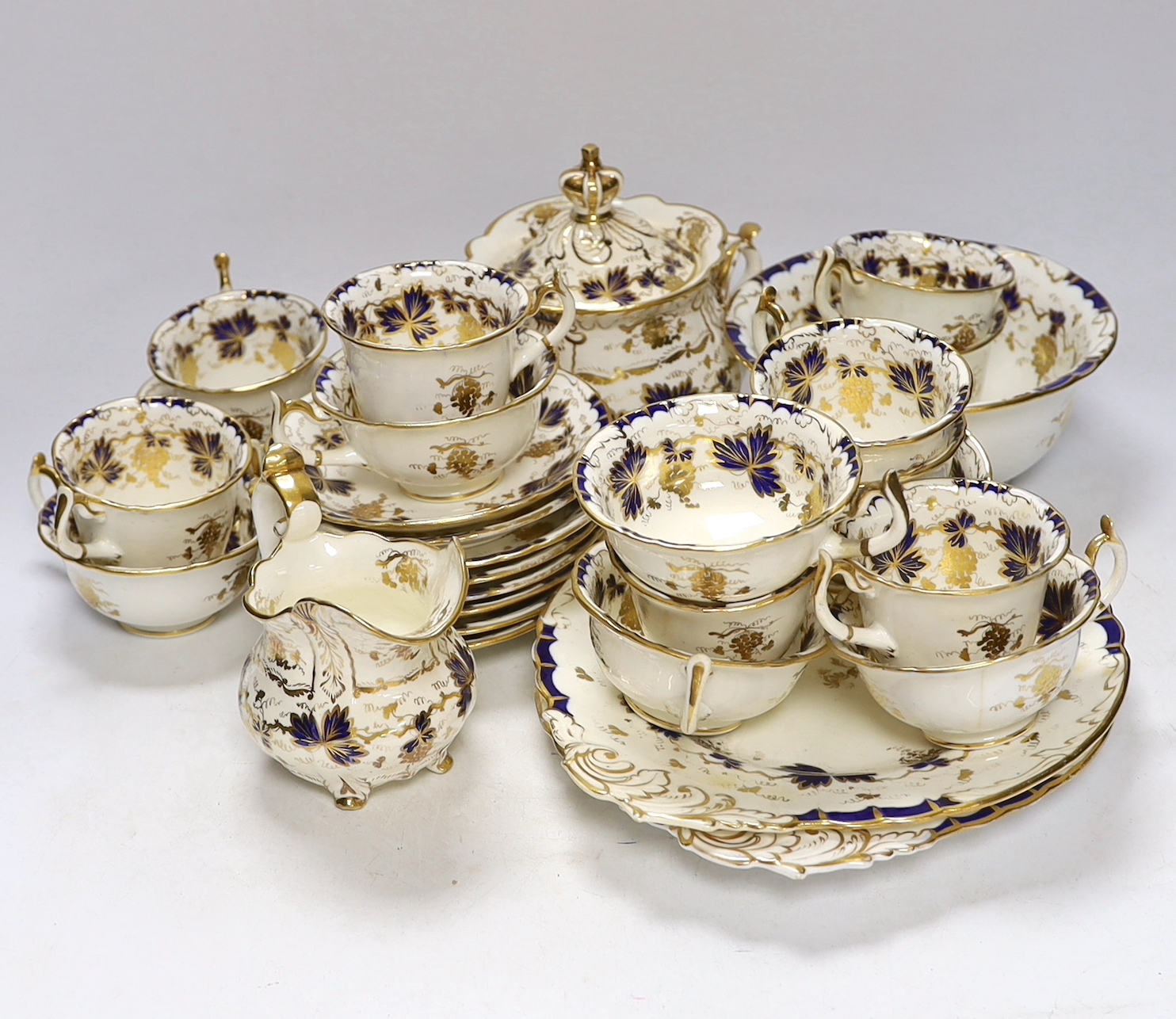 A mid 19th century Ridgeway style blue and gilt vine pattern twenty six piece part tea set